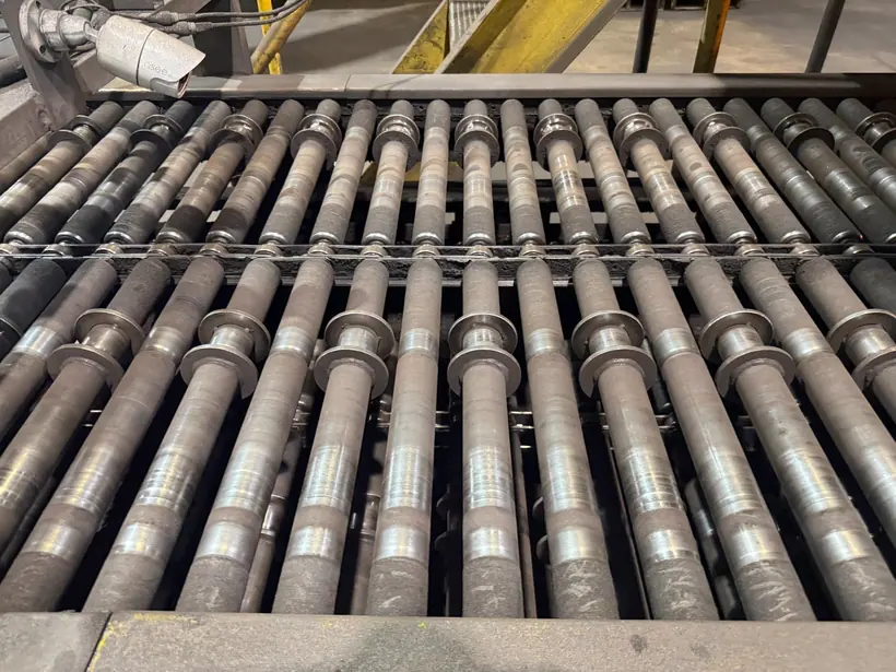 Physical furnace conveyor roller and chain system used as the basis for the CAD/CAM replacement work.